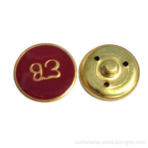 Metal button with enamel and embossed logo